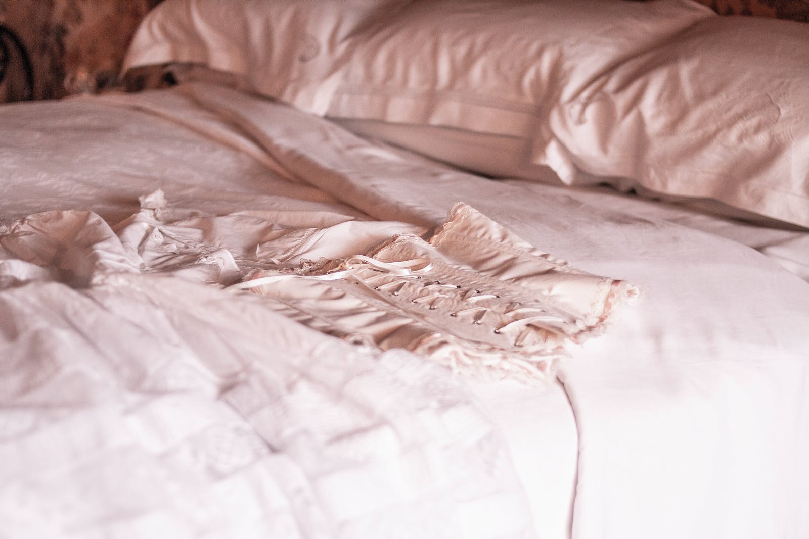 White Corset on Bed